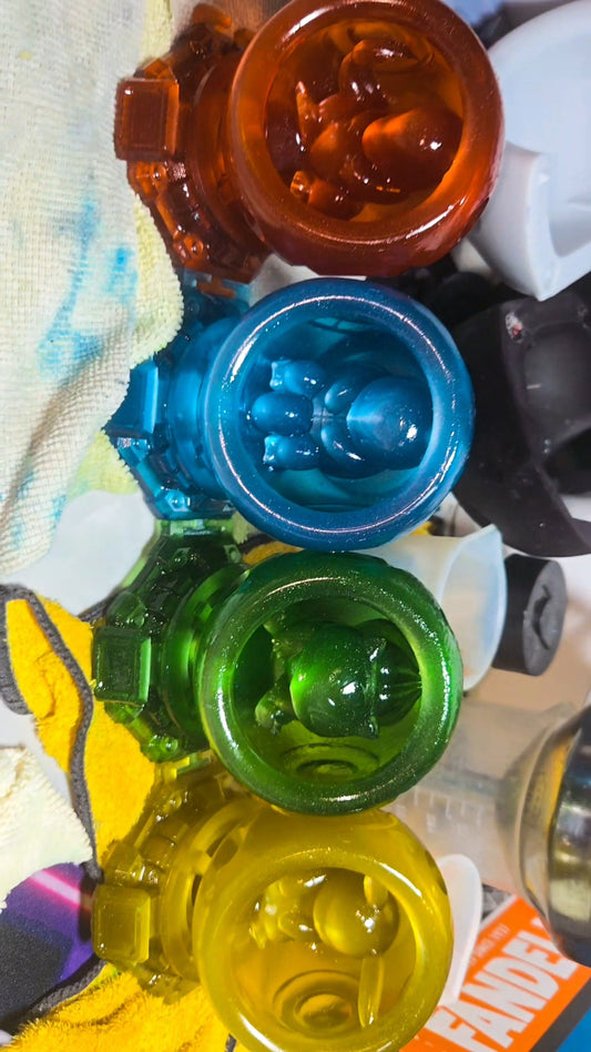 Small - Single Metallic Translucent Color Resting Mon in a Pod stand with Puck Light
